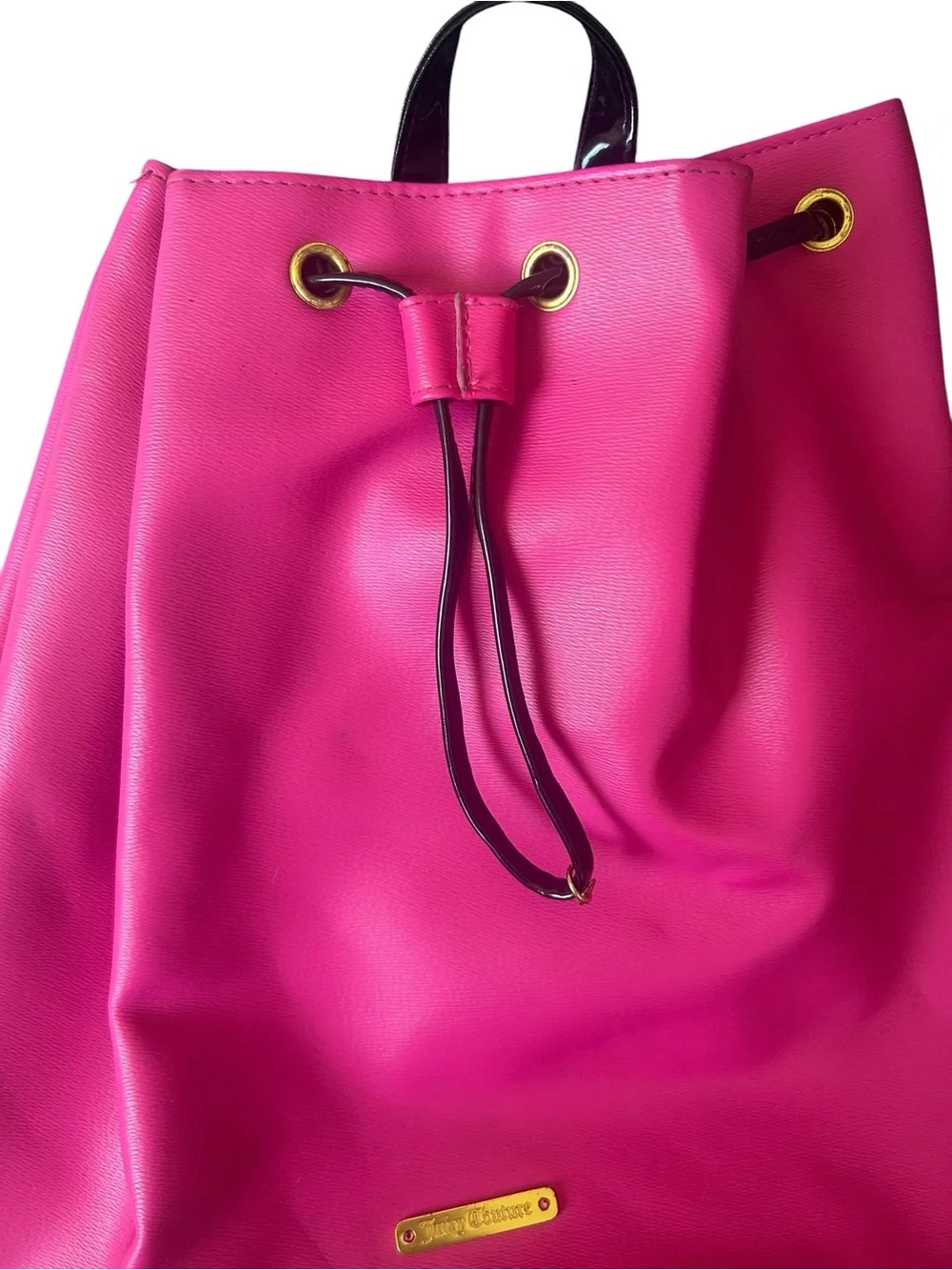 Juicy Couture Vibrant Pink Drawstring Backpack with Gold Accents